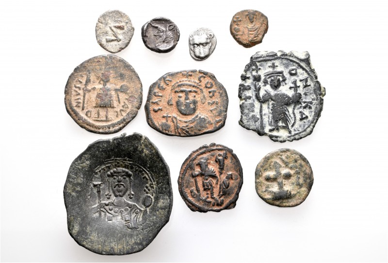 A lot containing 2 silver, 7 bronze coins and 1 lead tessera. Includes: Greek, R...
