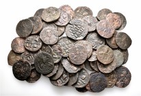 A lot containing 61 bronze coins. All: Byzantine. Fine to very fine. Harshly cleaned. LOT SOLD AS IS, NO RETURNS. 61 coins in lot.