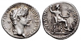 Tiberius. Denarius. 16 d.C. Lugdunum. (Spink-1763). (Ric-30). Anv.: TI CAESAR DIVI AVG F AVGVSTVS. Laureate head right. Rev.: PONTIF MAXIM; Livia seat...