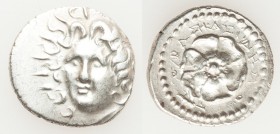 CARIAN ISLANDS. Rhodes. Ca. 84-30 BC. AR drachm (19mm, 4.24 gm, 12h). XF. Basileides, magistrate. Radiate head of Helios facing, turned slightly left,...