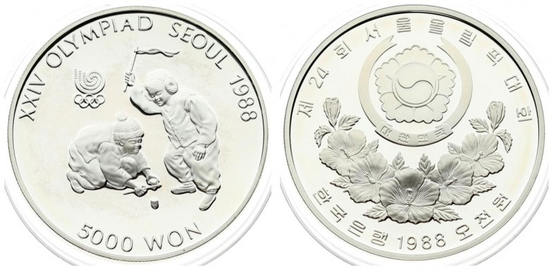 Korea-South 5000 Won 1988 1988 Olympics. Averse: Arms above floral spray. Revers...