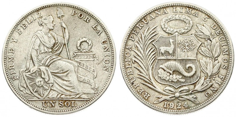 Peru 1 Sol 1924 Averse: National arms. Reverse: Seated Liberty flanked by shield...