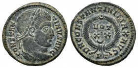 Constantino I. Follis. 322-325 d.C. Ticinum. (Ric-167). Anv.: CONSTANTINVS AVG. Cabeza laureada a derecha. Rev.: DN CONSTANTINI MAX AVG. VOT / X X / C...