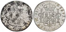 Carlos IV (1788-1808). 8 reales. 1800. Lima. IJ. (Cal-918). Ag. 27,07 g. Oxidaciones en anverso. MBC/MBC+. Est...50,00.