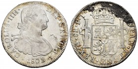 Carlos IV (1788-1808). 8 reales. 1802. México. FT. (Cal-975). Ag. 26,94 g. Oxidaciones en reverso. MBC. Est...50,00.