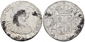 Carlos IV (1788-1808). 8 reales. 1804. México. TH. (Cal-980). Ag. 26,82 g. Oxidaciones. Restos de brillo original. MBC+. Est...60,00.