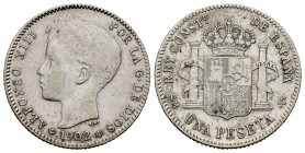 Alfonso XIII (1886-1931). 1 peseta. 1902*19-02. Madrid. SMV. (Cal-64). Ag. 4,97 g. BC+. Est...20,00.