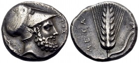LUCANIA. Metapontum. Circa 340-330 BC. Nomos or Didrachm (Silver, 20 mm, 7.94 g, 12 h). ΛEYKI-ΠΠOΣ Helmeted head of Leukippos to right; behind, hound ...