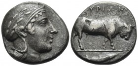 LUCANIA. Thourioi. Circa 443-400 BC. Stater (Silver, 19 mm, 7.57 g, 12 h). Head of Athena to right, wearing an Attic helmet ornamented with an olive b...
