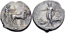 SICILY. Selinos. Circa 455-409 BC. Tetradrachm (Silver, 27 mm, 16.61 g, 11 h). Apollo and Artemis standing right in a quadriga moving slowly to right;...