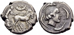 SICILY. Syracuse. Second Democracy, 466-405 BC. Tetradrachm (Silver, 24.5 mm, 17.07 g, 4 h), c. 450. Charioteer driving quadriga walking to right, hol...