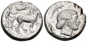 SICILY. Syracuse. Second Democracy, 466-405 BC. Tetradrachm (Silver, 23 mm, 16.59 g, 10 h), circa 450-440. Charioteer driving quadriga walking to righ...