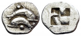 ISLANDS OFF THRACE, Thasos. Circa 435-411 BC. Obol (Silver, 9 mm, 0.52 g, 12 h). Two dolphins above one another, swimming in opposite directions; pell...