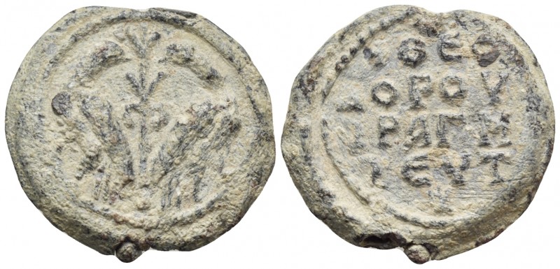 BYZANTINE SEALS. Theodoros pragmateutes, Circa 10th century. Seal or Bulla (Lead...