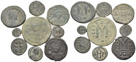 BYZANTINE. Circa 8th -12th century. (Bronze, 80.00 g). A lot of Nine (9) bronze coins, mostly Byzantine Folles and their denominations. Patinated. An ...