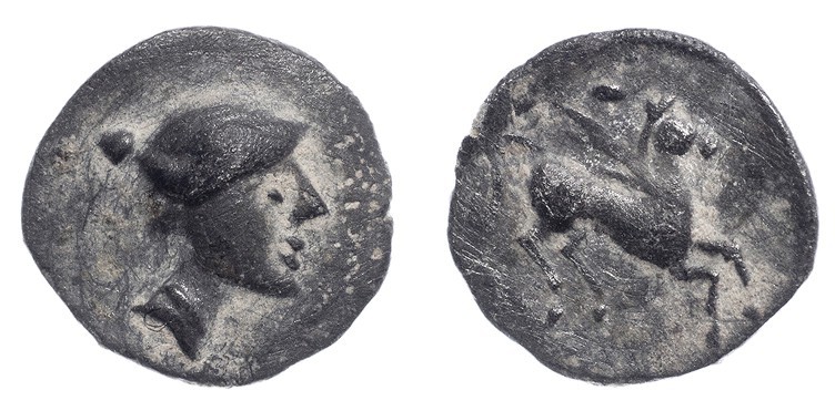 EMPORION. Tritartemorión (241-218 a.C.). A/ Cabeza femenina a der. con moño alto...