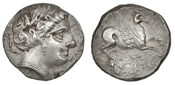 EMPORION. Dracma (218-206 a.C.). A/ Cabeza femenina a der., alrededor tres delfi...
