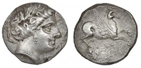 EMPORION. Dracma (218-206 a.C.). A/ Cabeza femenina a der., alrededor tres delfines. R/ Pegaso con la cabeza modificada a der., debajo delfín y ley. g...