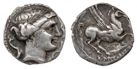 EMPORION. Dracma (principios del s. II a.C.). A/ Cabeza femenina a der., rodeada por tres delfines. R/ Pegaso a con la cabeza modificada a der., debaj...