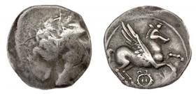 EMPORION. Dracma (principios del s. II a.C.). A/ Cabeza femenina a der., rodeada de tres delfines no visibles. R/ Pegaso con cabeza modificada a der.,...