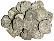 18 monedas de 2 reales. Felipe II y Felipe III. Granada, Sevilla. Toledo y Valladolid. Algunas con oxidaciones. De BC a MBC.