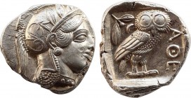 ATTICA. Athens. Tetradrachm (Circa 454-404 BC).
Obv: Helmeted head of Athena right, with frontal eye.
Rev: AΘE.
Owl standing right, head facing; olive...
