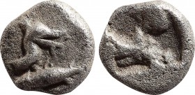 MYSIA, Kyzikos. Circa 520-480 BC. AR Obol.
Obv: Head and neck of bird right, its beak extending over head of tunny upward to right.
Rev: Irregular i...