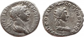 TRAJAN (98-117). Denarius. Rome.
Obv: IMP CAES NER TRAIANO OPTIM AVG GERM DAC.
Laureate and draped bust of Trajan right.
Rev: PARTHICO P M TR P COS VI...