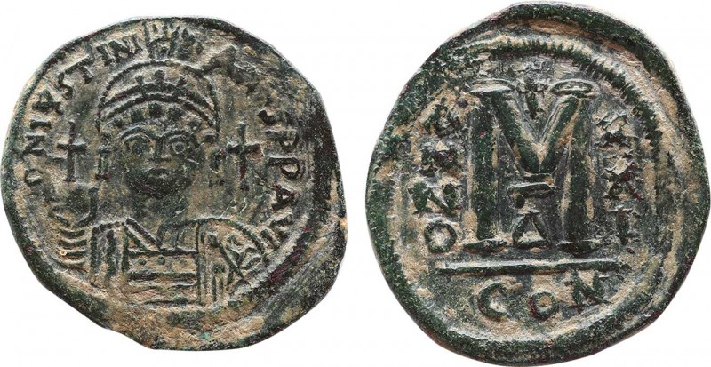 JUSTINIAN I (527-565). Follis. Constantinople.
Obv: D N IVSTINIANVS P P AVC.
Hel...