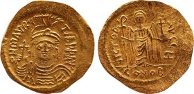 MAURICE TIBERIUS (582-602). GOLD Solidus. Constantinople.
Obv: δ N MAVRIC TIЬЄ P P AVI.
Crowned and cuirassed facing bust, holding globus cruciger and...