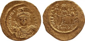 MAURICE TIBERIUS (582-602). GOLD Solidus. Constantinople.
Obv: δ N MAVRC TIЬ P P AVG.
Draped and cuirassed facing bust, wearing plumed helmet and hold...