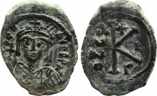 MAURICE TIBERIUS (582-602). Half Follis. Constantinople. Dated RY 1 (582/3).
Obv: DN TIBER MAV PP AV.
Crowned and cuirassed bust facing, holding globu...