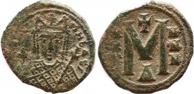 IRENE (797-802). Follis. Constantinople.
Obv: ЄIRINH ЬAS.
Crowned facing bust, holding cruciform sceptre and globus cruciger.
Rev: Large M; X/X/X - N/...