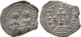 Heraclius, with Heraclius Constantine. 610-641. AR Hexagram.Constantinople mint. Struck 615-638. 
Obv: Heraclius and Heraclius Constantine seated faci...