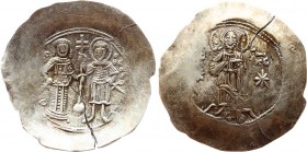 Manuel I Comnenus (1143-1180). EL aspron trachy. Constantinople, 1160-1164. 
Obv: Barred IC - XC, Christ Pantocrator standing facing on low daïs, with...