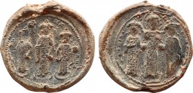 BYZANTINE LEAD SEALS. Romanus IV Diogenes (1068-1071). Obv: Christ standing facing on dais, crowning Romanus to left and Eudokia to right, each holdin...