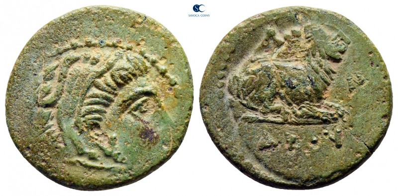 Kings of Macedon. Pella or Amphipolis. Kassander 306-297 BC. 
Bronze Æ

18 mm...