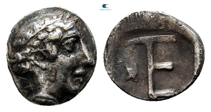 Ionia. Kolophon circa 450-400 BC. 
Tetartemorion AR

7 mm., 0,32 g.



ve...