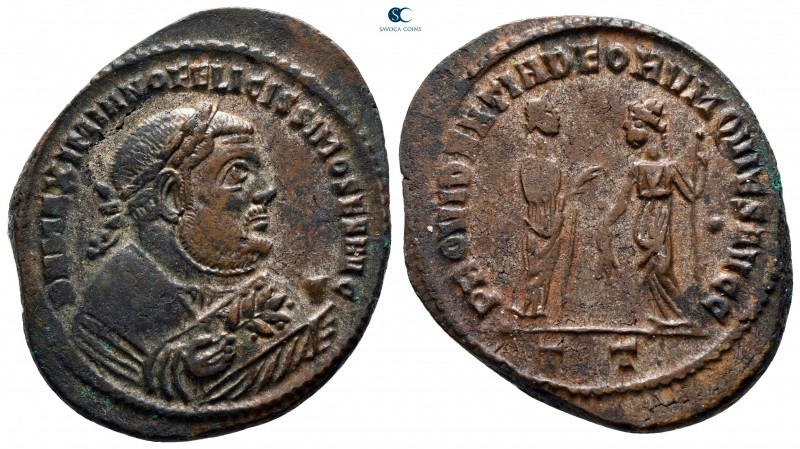 Maximianus Herculius, second reign AD 306-308. Ticinum
Follis Æ

31 mm., 9,11...