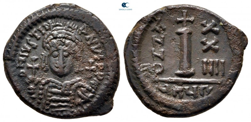 Justinian I AD 527-565. Theoupolis (Antioch)
Decanummium Æ

21 mm., 5,04 g.
...