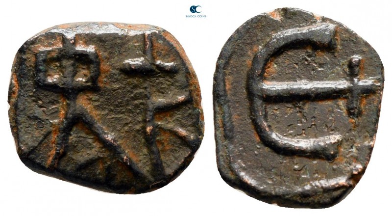 Justin II AD 565-578. Theoupolis (Antioch)
Pentanummium Æ

12 mm., 1,16 g.
...