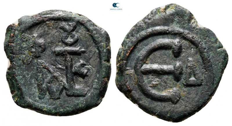 Justin II and Sophia AD 565-578. Constantinople
Pentanummium Æ

16 mm., 1,80 ...