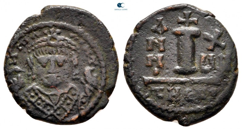 Maurice Tiberius AD 582-602. Theoupolis (Antioch)
Decanummium Æ

17 mm., 2,47...