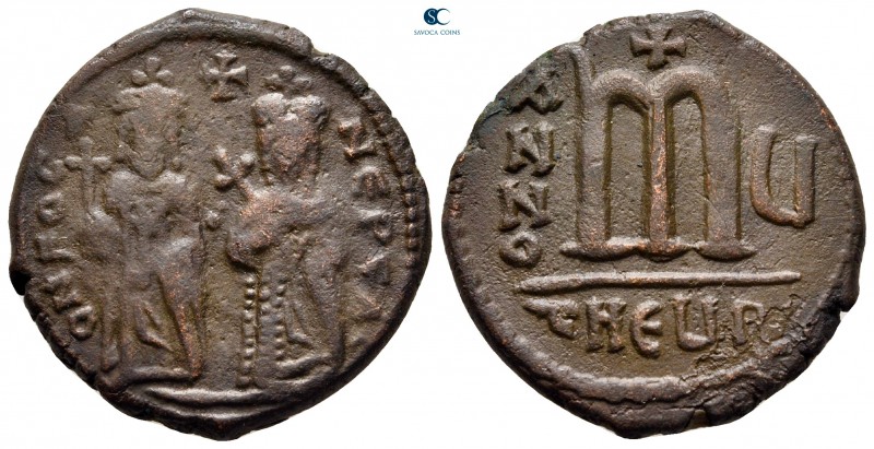 Phocas, with Leontia AD 602-610. Theoupolis (Antioch)
Follis or 40 Nummi Æ

2...