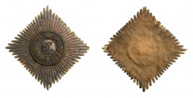 Embroidered Breast Star. Ca. 1800-1820. First Class. 

78 x 78 mm, 108 mm from left to right arm tip. Silver gilt wire with embossed rays. Leather a...
