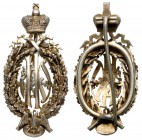 Jubilee Badge of Empress Maria’s Department of Establishments.

P/B 4.29. Silver. By Dmitri Osipov. Imperial crown atop oak wreath, monogram of Mari...