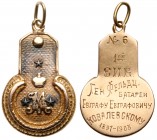 Jetton for a Colonel of the Michael Artillery Academy.

Gold. 5.85 gm. Colonel’s epaulettes. Engraved on back: ‘№ 6 / 1 ой / Е И В / Ген Фельдц. / Е...