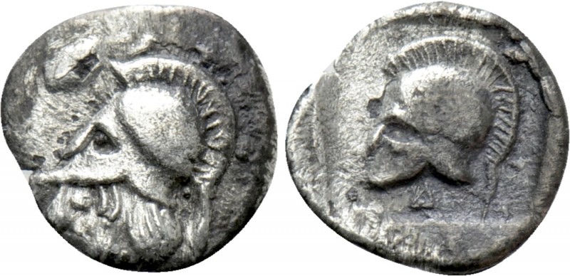 GREEK. Uncertain. Hemiobol (Circa 5th-4th centuries BC). 

Obv: Helmeted head ...