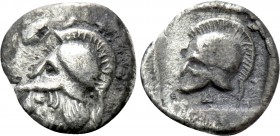 GREEK. Uncertain. Hemiobol (Circa 5th-4th centuries BC). 

Obv: Helmeted head of Athena left.
Rev: Helmet left within incuse square.

SNG Copenha...