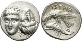 MOESIA. Istros. Drachm (4th century BC). 

Obv: Facing male heads, the right inverted.
Rev: ΙΣΤΡΙΗ. 
Sea eagle right, grasping dolphin with talons...